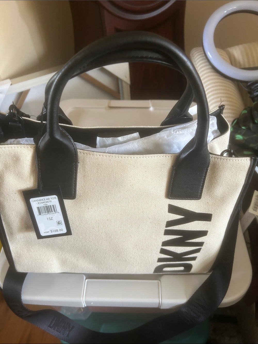 DKNY Cream Canvas Tote with Black Trim and Strap long strap on